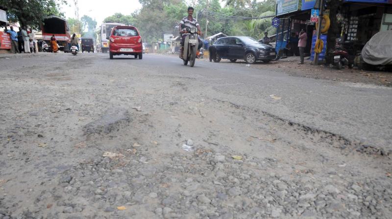 A severely damaged section of Vazhuthacaud-Thirumala road at Edappazhinji. (Photo: DC)