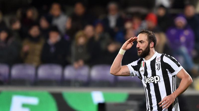 Higuain is the only player who has moved initially on loan, with Milan paying 18 million euros ($21 million) for the services of the 30-year-old Argentina forward for next season. (Photo: AFP)