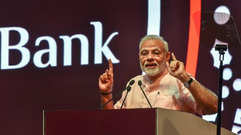 Prime Minister Narendra Modi adderesses during the launch of India Post Payments Bank (IPPB), in New Delhi. (Photo: PTI)