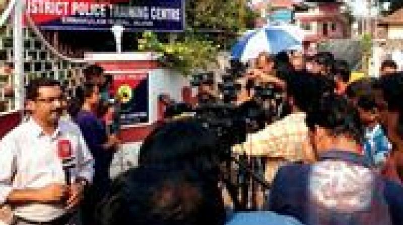 Journalists rush before Aluva Police Club, where the accused were being  interrogated in Kochi on Thursday. (Photo: DC)