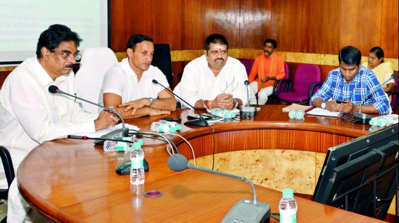 Vizag and Anakapalle MPs K. Haribabu and Muttamsetti Srinivas Rao hold a review meet with  officials in Visakhapatnam on Thursday.