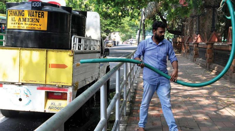 A water company in the city taking water from Mananchira Square in order to meet the increasing demand for water on Wednesday.  (Photo: VENUGOPAL)