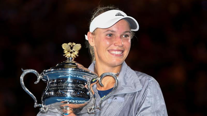 Wozniacki had not won a set in either of her previous two Grand Slam final appearances and tightened visibly serving for this one at 5-3. (Photo: AFP)