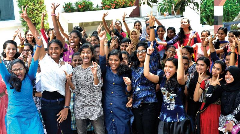 Students of Carmel Girls HSS, Thiruvananthpuram, who scored full A+ in SSLC, rejoice after the results are announced.  DC FILE