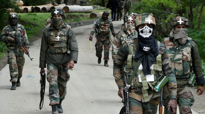 Army personnel during an anti-militancy operation in south Kashmirs Shopian district. (Photo: PTI)