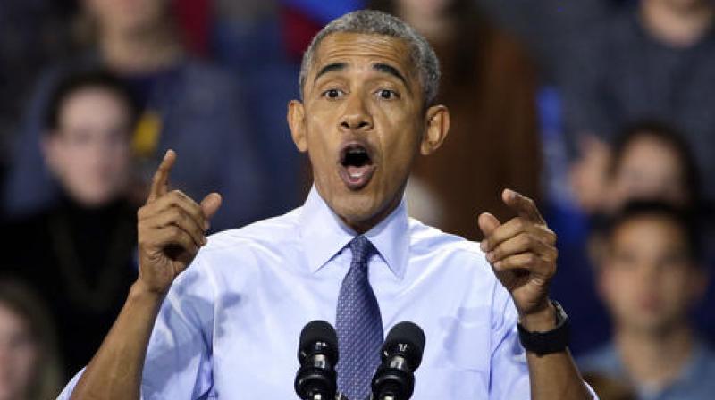 US President Barack Obama speaks at a campaign event for Democratic presidential candidate Hillary Clinton at the University of New Hampshire. (Photo: AP)