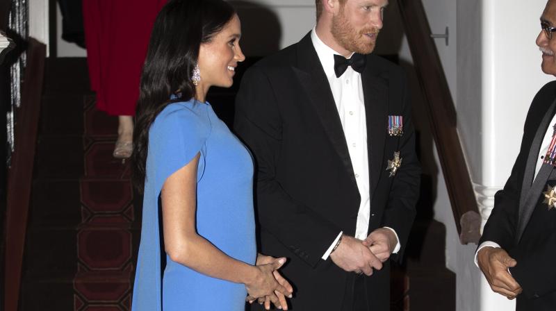 Britains Prince Harry and Meghan, Duchess of Sussex at the official dinner in Suva, Fiji, Tuesday, Oct. 23, 2018. Prince Harry and his wife Meghan are on day eight of their 16-day tour of Australia and the South Pacific. (Photo: AP)