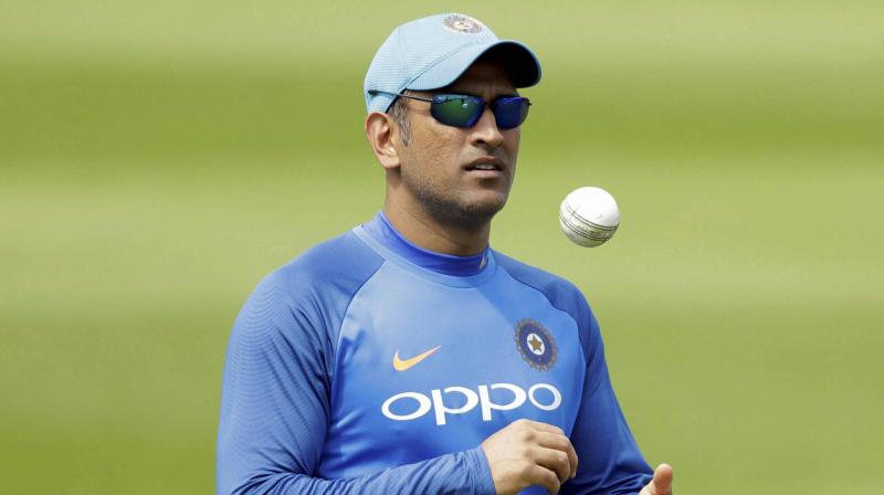 Mahendra Singh Dhoni is quintessentially a modest man and no wonder he has politely declined to inaugurate the pavilion named after him at the JSCA Stadium, ahead of Indias third ODI against Australia. (Photo: