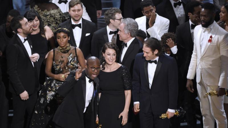 Barry Jenkins with the cast and crew of Moonlight.