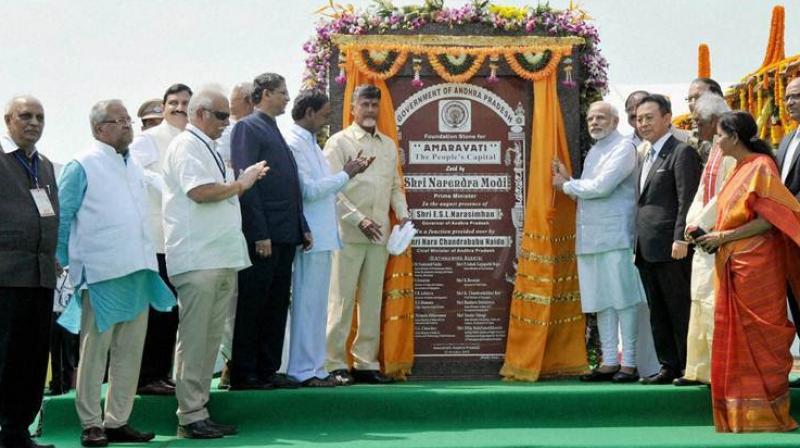 Prime Minister Narendra Modi and Andhra Pradesh Chief Minister Chandrababu Naidu lay the foundation stone of Amaravati. (Photo: PTI/File)