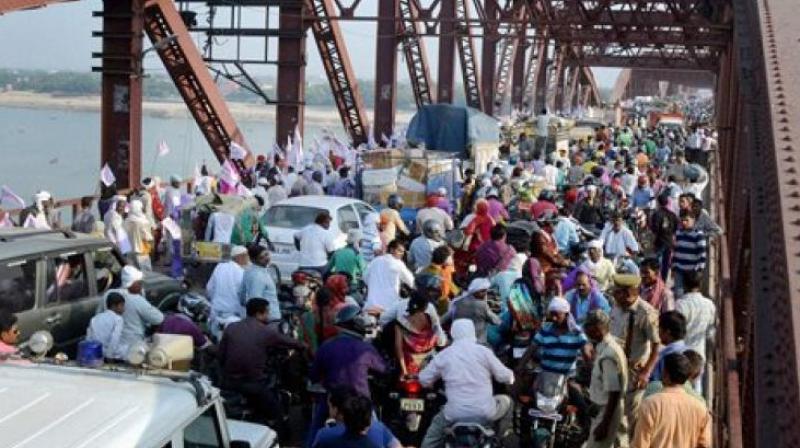 In Varanasi, eye witnesses claim that a rumour of the bridge cracking up led to the stampede.