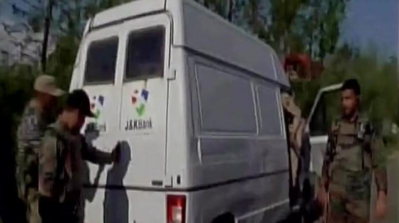 Five J&K policemen and two bank employees were killed when gunmen attacked a cash van in southern Kulgam district on Monday afternoon. (Photo: ANI/Twitter)