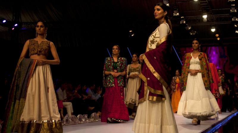 In Photos: Models adorn traditional designs at Pakistan Fashion Week