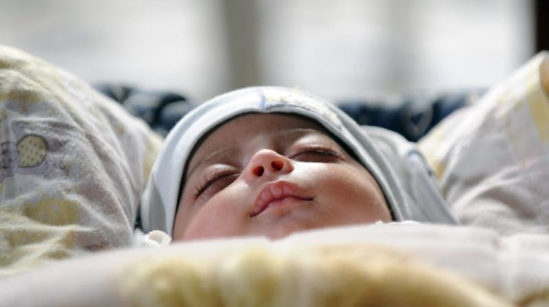 Sleep problems were reported less frequently in the group introducing solids before six months (Photo: AFP)