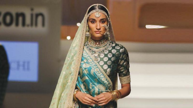 Model in a Sabyasachi outfit.  Pictures for representational purpose only