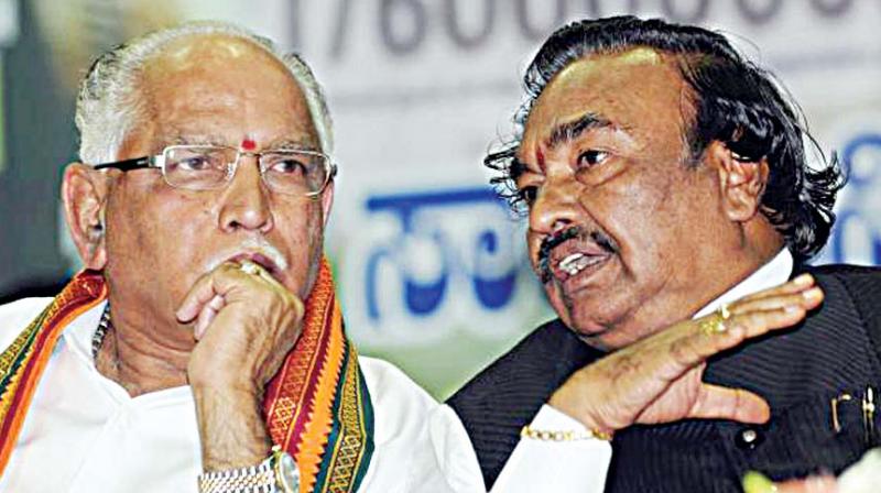 Former chief minister and BJP state president B.S. Yeddyurappa and former deputy CM K.S. Eshwarappa in happier times