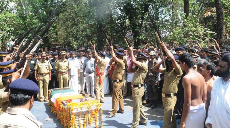 Military personnel pay last respects to martyr Kalathilveetil Sreejith at the funeral held at Paruthipulli in Palakkad on Saturday. (Photo: DC)