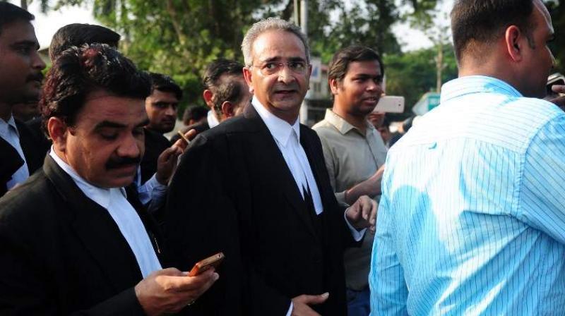 Lawyer Tanveer Ahmed Mir (Centre) on Friday confirmed that he will be defending the 16-year-old student accused in the murder of Pradyuman Thankur in Gurgaons Ryan International School. (Photo: AFP)