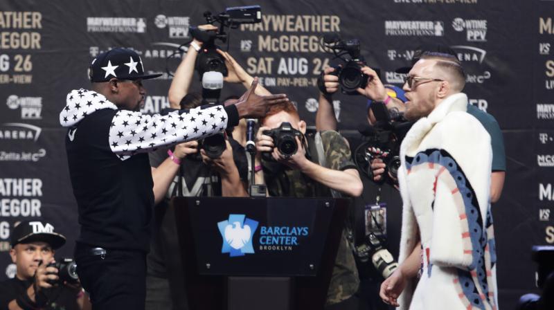 Floyd Mayweather and Conor McGregor are set to face each other in a boxing ring in Las Vegas on August 26 in what could be the richest fight in history. (Photo: AP)