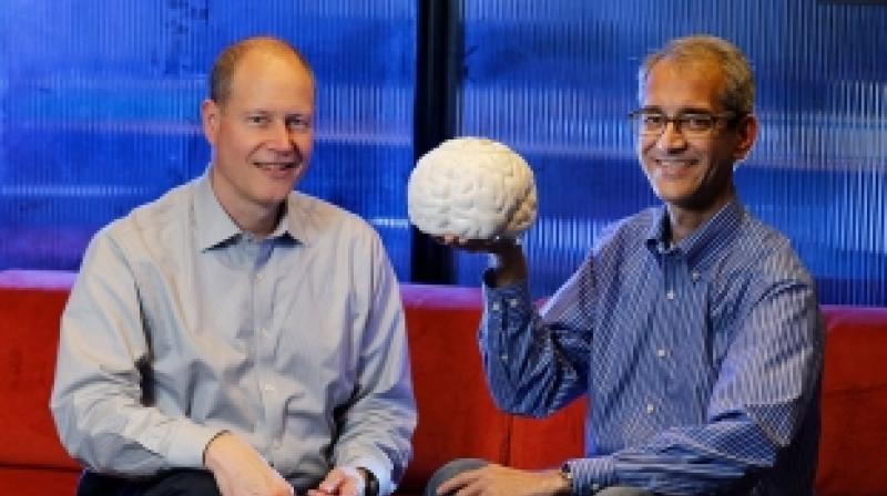 Stanfords Jaimie Henderson and Krishna Shenoy are part of a consortium working on an investigational brain-to-computer hookup. (Image: Stanford News)