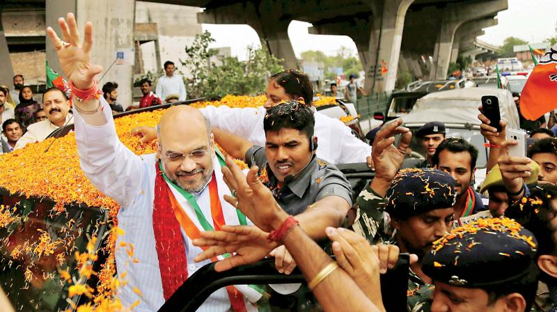 BJP national president Amit Shah gets a rousing reception in Jammu on Saturday. (Photo: PTI)