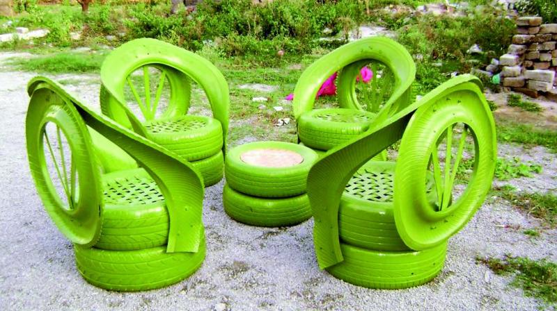 Furniture made from waste tyres on display.