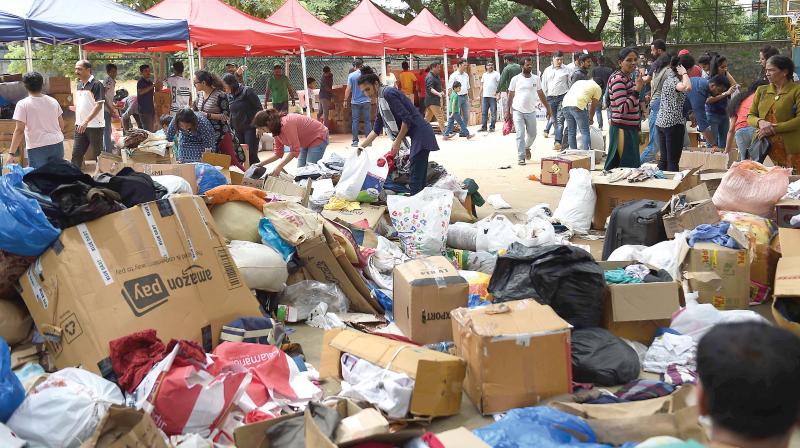 Flood relief materials being collected at Kodava Samaj in Bengaluru on Sunday 	   (Image: DC)