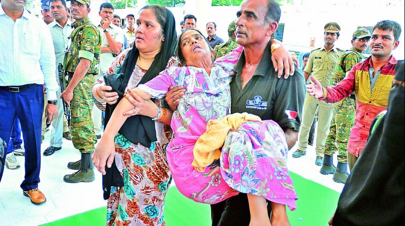 With no paramedical staff around to help, a womans relatives had to carry her to the casualty section of the hospital on Saturday.
