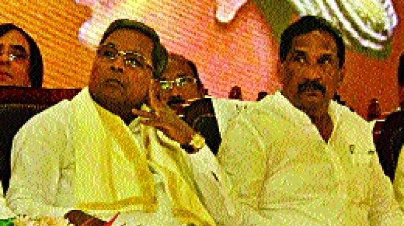 CM Siddaramaiah and minister K.J. George at a function in Vidhana Soudha