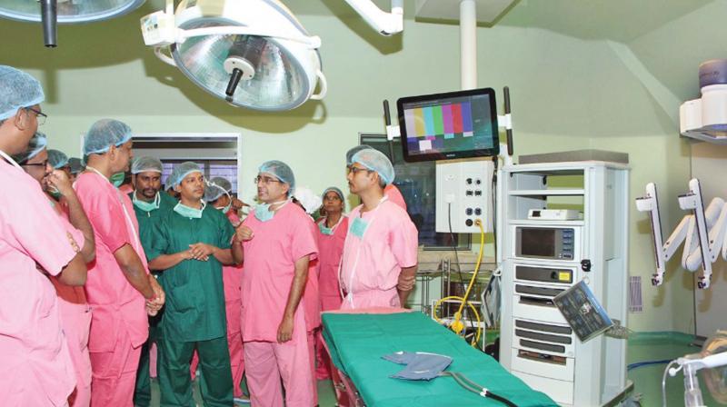 A team of doctors from the institute who performed robotic-assisted partial  nephrectomy on a patient with renal cancer. 	 DC