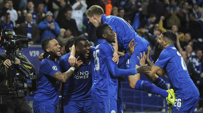 Down 2-1 from the first leg last month in Spain, Leicester rolled back the clock to last seasons Premier League title heist as goals by skipper Wes Morgan and Marc Albrighton put them in the last eight in their first crack at Europes elite competition. (Photo: AP)