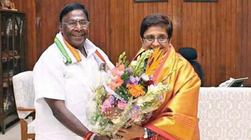 Puducherry Chief Minister V. Narayanasamy greeting Lt Governor Kiran Bedi on Wednesday. (Photo: DC)