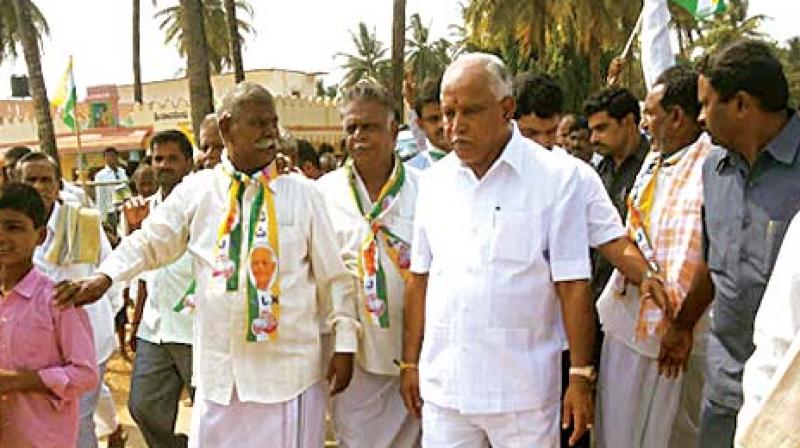 In this file photo, former CM and BJP state president B.S. Yeddyurappa campaigns in Shikaripura constituency in Shivamogga district