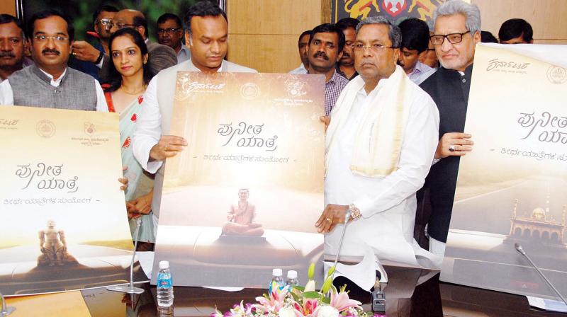 Chief Minister Siddaramaiah launched Puneeta Yathre, a package tour to religious places in the state, at Vidhana Soudha in Bengaluru on Wednesday