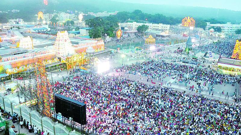 People in large number witness Srivari Garuda Seva in Tirumala on Wednesday.