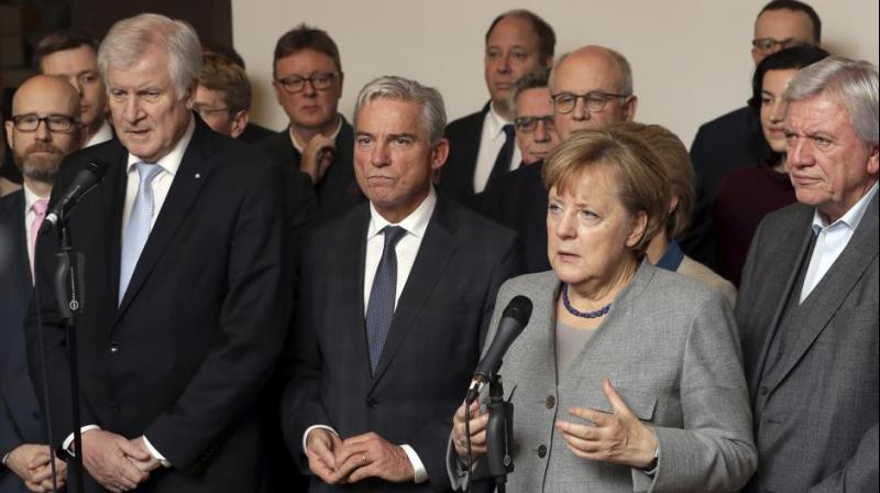German Chancellor and chairwomen of the German Christian Democratic Union Angela Merkel addresses the media on the results of their exploratory talks on a coalition of the German Liberals, the Green Party, the Christian Democrats and the Christian Social Union, in Berlin on Monday. (Photo: AP)