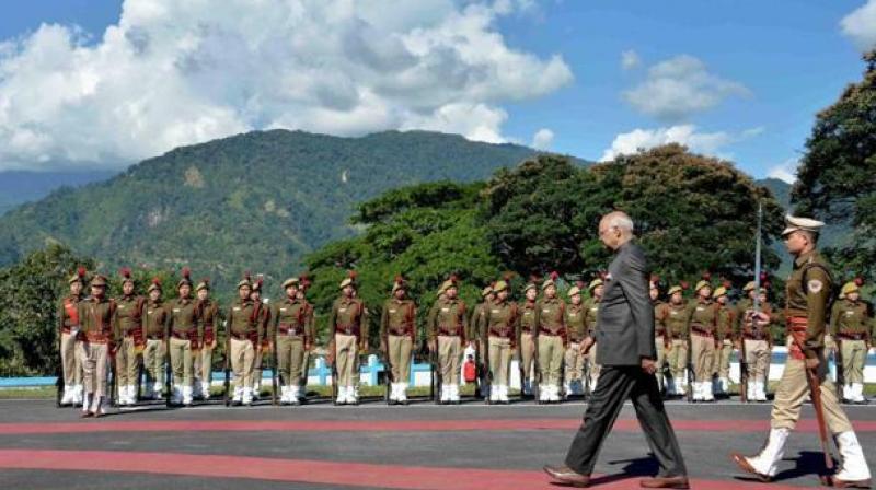 President Ram Nath Kovind inspecting the guard of honour on his arrival at Raj Bhavan helipad in Itanagar on Sunday. (Photo: PTI)