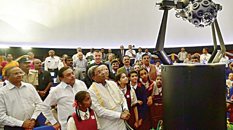 Even as his fellow Kuruba and BJP leader K.S. Eshwarappa fought a battle with former CM B.S. Yeddyurappa, Chief Minister Siddaramaiah enjoyed a session with kids at the inauguration of the planetarium hybrid projection system at Jawaharlal Nehru Planetarium in Bengaluru on Tuesday.