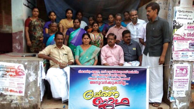 Locals protest against the battery assembling unit in Muchukunnu near Koyilandy. 	(File picture).