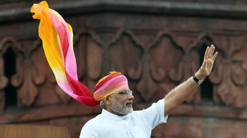 Prime Minister Narendra Modi waves at crowd (Photo: PTI)