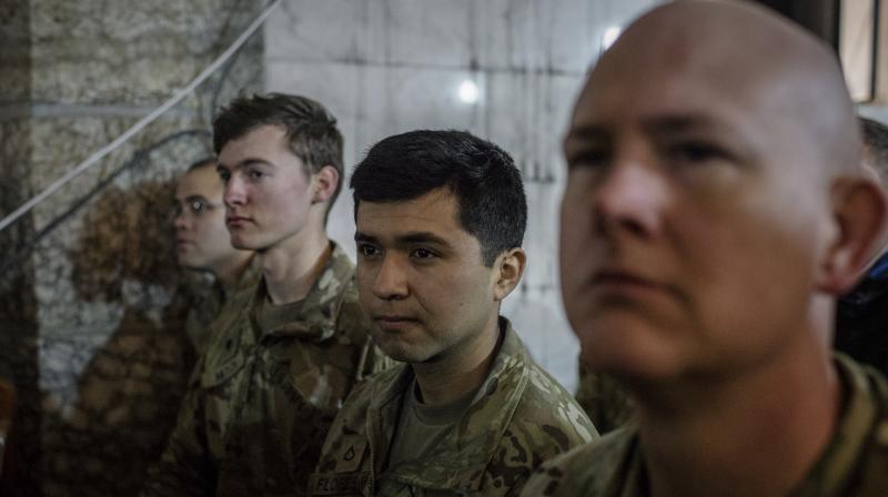 U.S. Army personal attend Christmas Eves Mass in the Assyrian Orthodox church of Mart Shmoni, in Bartella, Iraq. (Photo: File/AP)