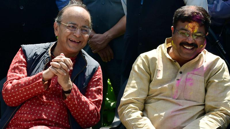 Finance Minister Arun Jaitley and Minister of Petroleum and Natural Gas, Dharmendra Pradhan. (Photo: PTI)