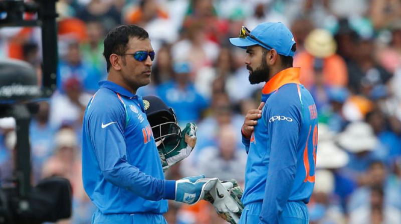 Referring to Kohli as Cheeku, Dhoni also was heard taking a call on field placements. (Photo: AFP)