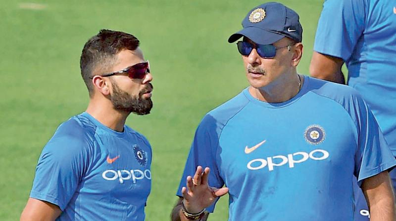 Ravi Shastri on Monday heaped special praise on Virat Kohli after he notched up his 50th International century here and said \sky is the limit\ for the skipper who stands at the halfway stage in equalling Sachin Tendulkars feat. (Photo: PTI)