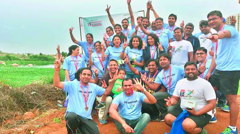 Over 1,200 people from 132 societies held a 5K run to focus attention on the dying 111-acre Gangaram lake in Serilingampally on Sunday. 	(Photo: DC)