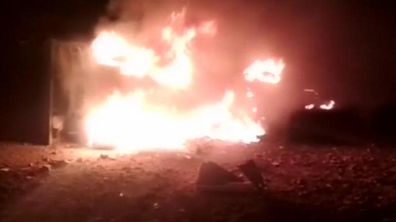 Reportedly, the fire that broke out in the quarry, spread to the nearby area and burnt three tractors, one lorry and two sheds to ashes. (Photo: ANI | Twitter)