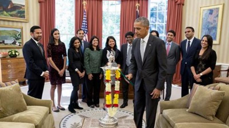 Obama talked about this momentous occasion in a Facebook post soon after he kindled the diya in his Oval Office with some Indian-Americans working in his administration. (Photo: Twitter/White House)