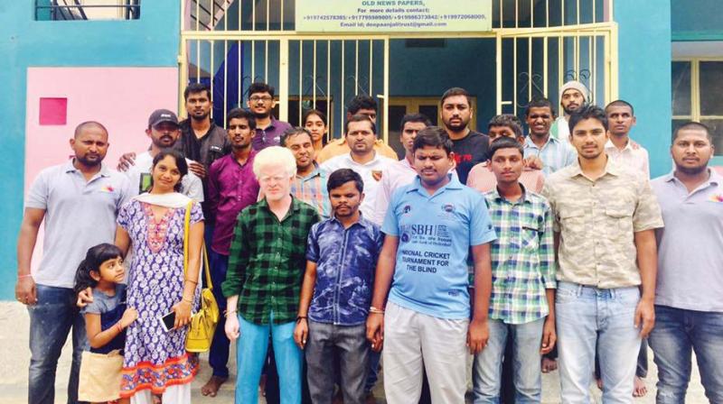 Guests in front of Deepaanjali Trust off Bannerghatta Road after distributing food to the students.