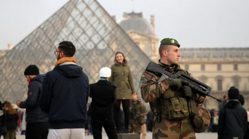 With a day to go before New Years Eve final countdown, Frances Interior and Defense Ministers reassured tourists in the capital and insisted security forces were in place to protect them. (Photo: AP)