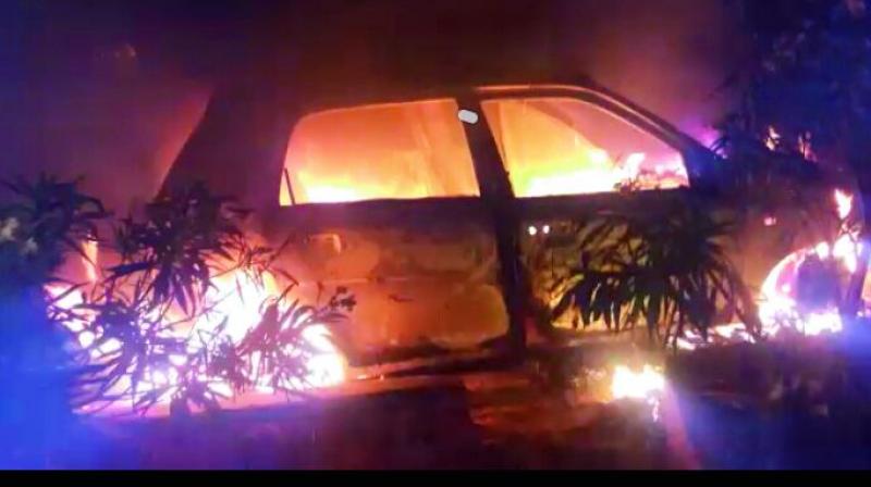The burnt car that killed Bhuma Rao, a farmer.
